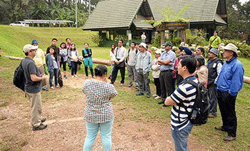 Trainers and participants in the field